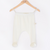 Mokopuna Merino footed pants in cream Lily color