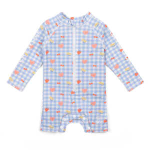 Baby swim suit with heart pattern on a white background