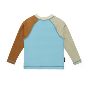 Long-sleeve swim rash top with color-blocked design on a white background