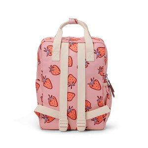 Pink backpack with strawberry pattern on a white background