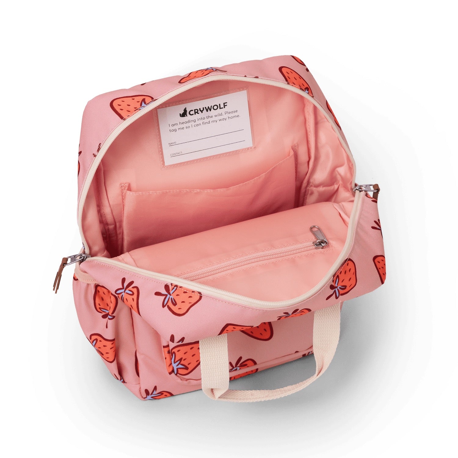 Pink backpack with strawberry pattern on a white background