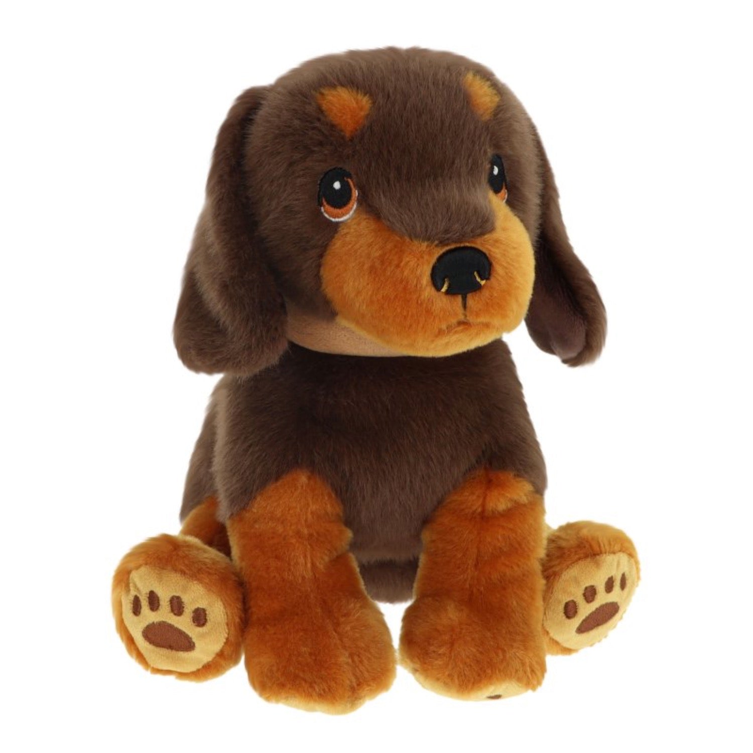 Plush toy dog with brown and orange fur on a white background