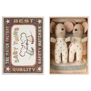 Two plush toy mice in a matchbox with a vintage-style matchbox labeled 'Best Match Twins'.