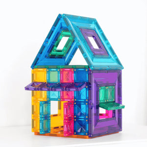 Colorful magnetic building block set shaped like a house on a white background