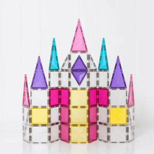 Colorful castle-shaped glass ornament on a white background