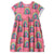 Pink dress with rainbow patterns on a white background
