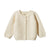 A beige, button-up Nature Baby cardigan for babies.