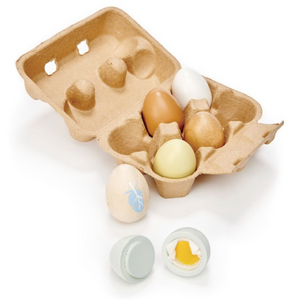 Tender Leaf brand, 6 wooden eggs in a cardboard egg box. One cracks open to show the felt egg