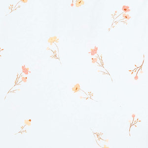Toshi swim fabric Willow design minimal sprigs of flowers on a pale blue background 