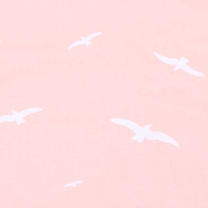 Toshi Swim fabric Palm Beach design white seagulls flying on a pale pink background